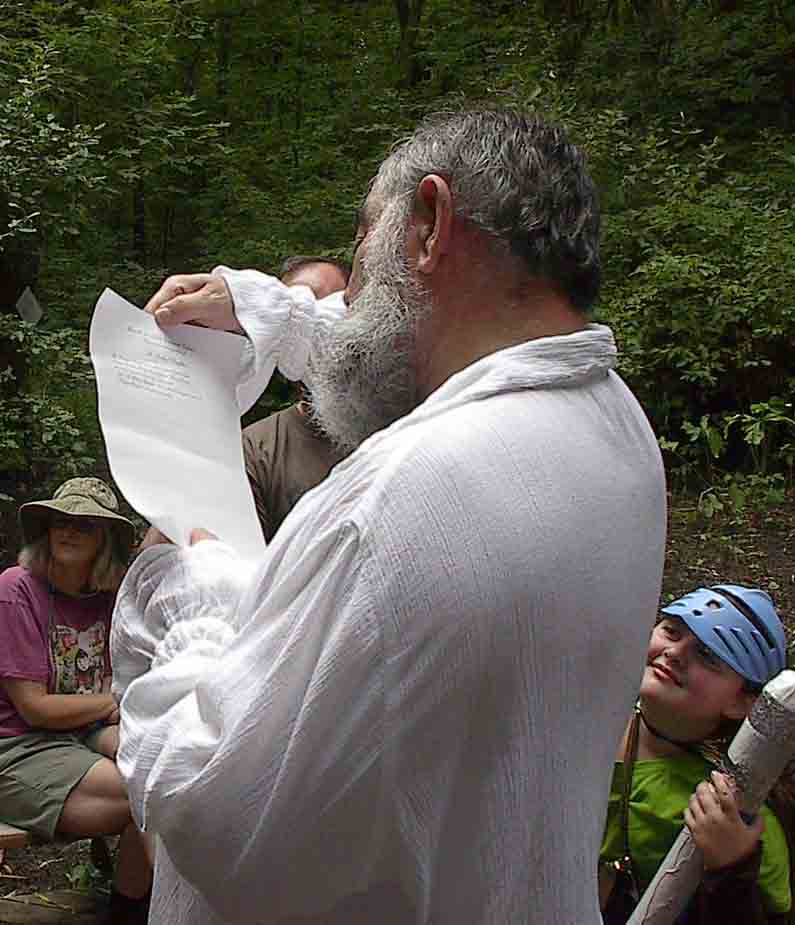 The King reads the scroll